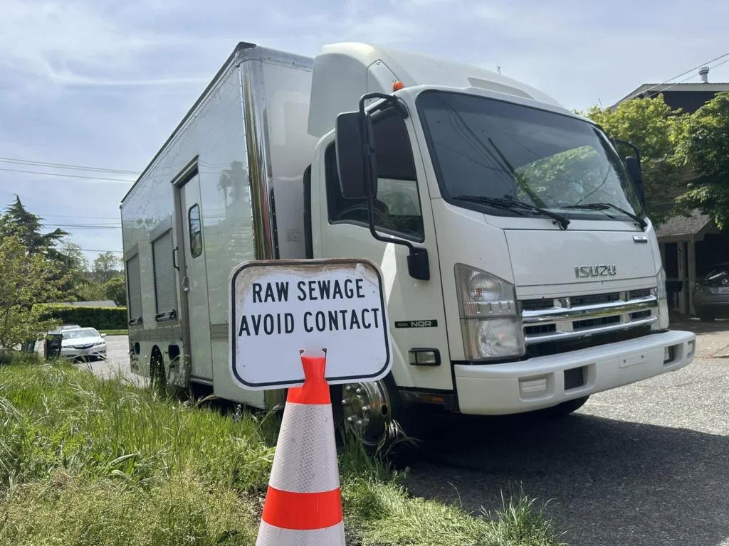 sewer-inspections-raw-sewage-warning-sign-truck-seattle