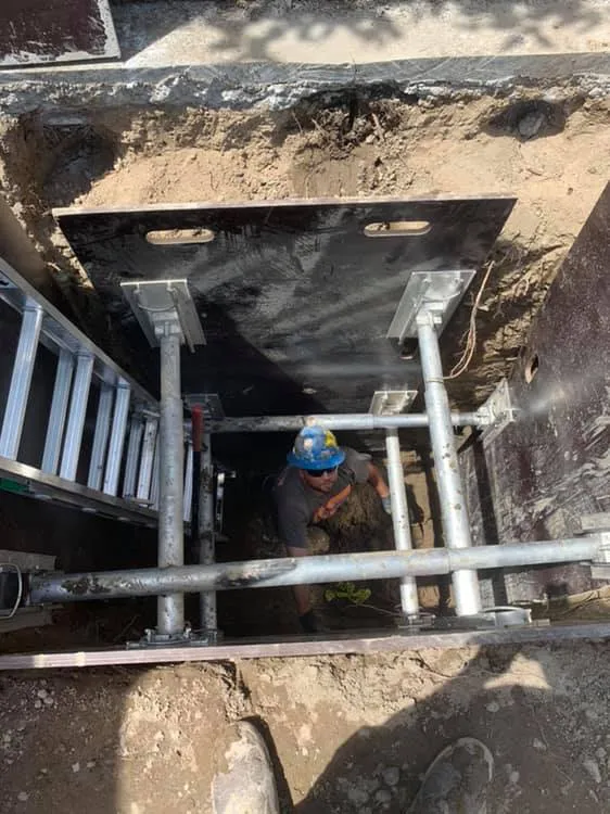sewer-inspection-worker-in-trench-box-close-up-seattle