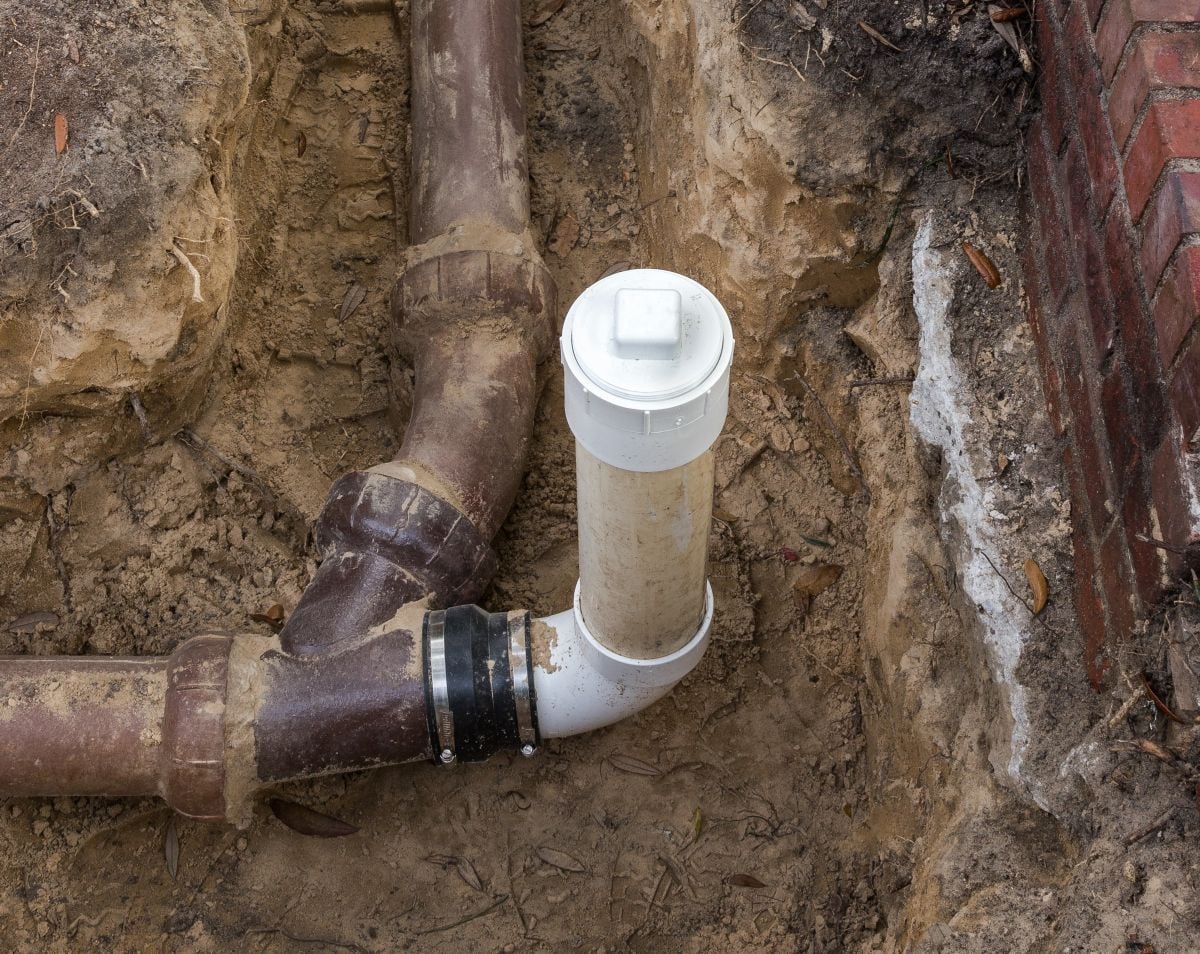 PVC Sewer Line Clean Out Installed on Ceramic Clay Sewer Line