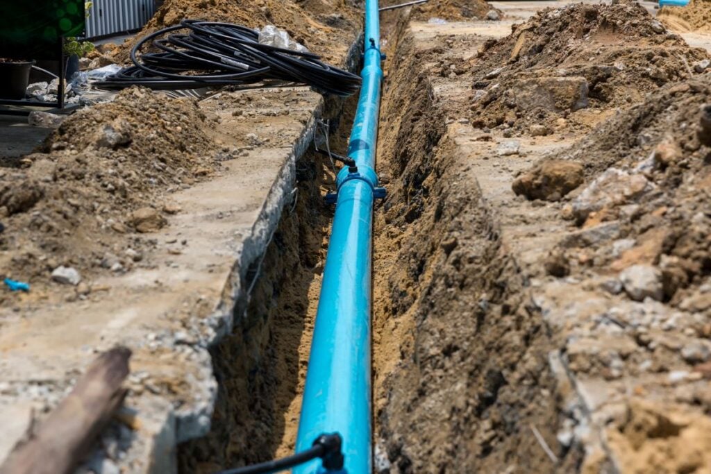 Construction site with new Water Pipes in the ground