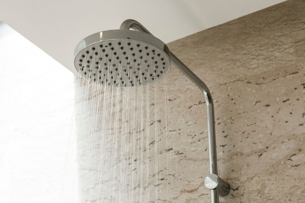 Close up of water shower faucet in the bathroom